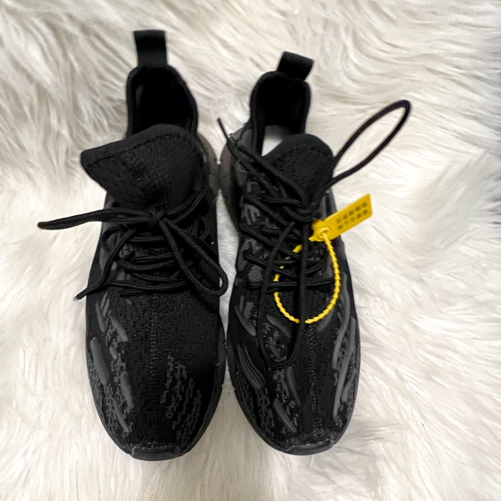 Brand new all black sneakers